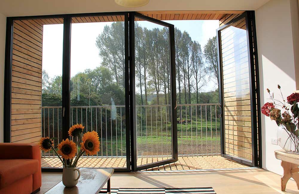 SUNFLEX SF75 Bifold Doors feature on Grand Designs