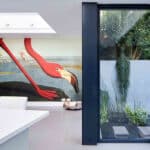 Thumbnail of http://Modern%20room%20with%20large%20flamingo%20mural%20on%20the%20wall.%20Glass%20doors%20open%20to%20a%20small%20garden%20with%20minimal%20foliage.%20White%20furniture%20and%20sleek%20surfaces%20create%20a%20contemporary%20ambiance.