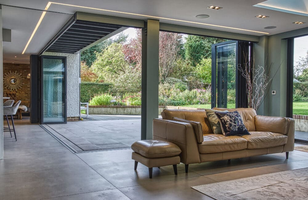 Contemporary Surrey renovation with open corner bifold doors