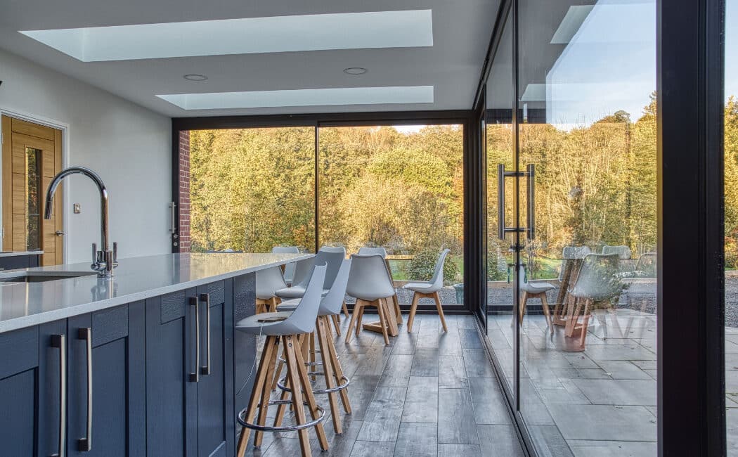 Modern extension to red brick Cheshire home