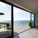 Thumbnail of http://Myrio%20Cornish%20clifftop%20home%20with%20expansive%20bifold%20doors%20opening%20to%20ocean%20views%20and%20terrace%20at%20Sennen%20Cove.